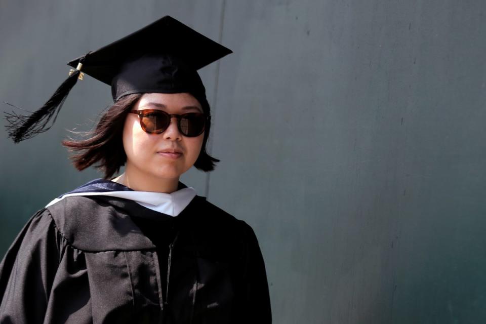 A graduate lines up for the Baruch College Commencement Exercise at the Barclay's Center in the Brooklyn borough of New York City, U.S., May 27, 2016. REUTERS/Brendan McDermid