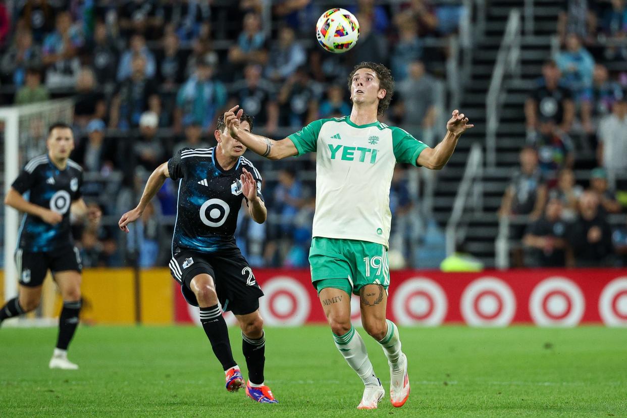 Austin FC midfielder CJ Fodrey takes a pass against Minnesota United during Saturday's game at Allianz Field in Saint Paul, Minn.  The Verde & Black won 1-0 and got a rare win on the road.