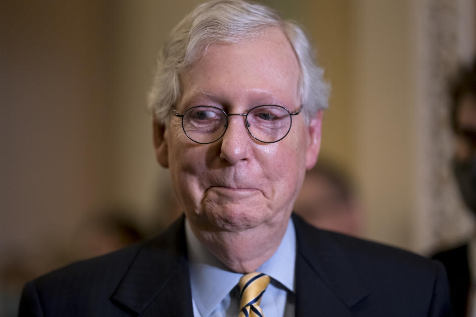 Senate Minority Leader Mitch McConnell, R-Ky., smiles as he and the GOP leadership speak to reporters after a weekly GOP policy meeting, at the Capitol in Washington, Tuesday, Sept. 21, 2021. Democratic congressional leaders, backed by the White House, have announced they will push ahead with a vote to fund the government and suspend the debt limit, all but daring Republicans to quit opposing the package or risk a fiscal crisis. (AP Photo/J. Scott Applewhite)