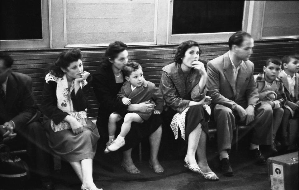 People waiting to disembark at the Ellis Island Immigration Station in New York, N.Y., in October of 1950. The Greco family is at right.