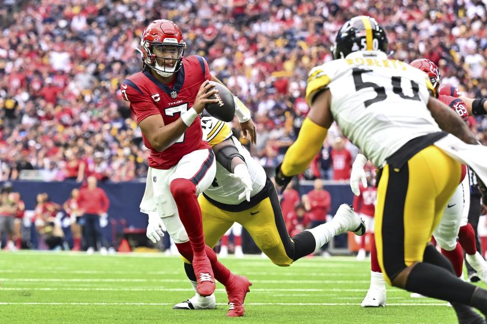 Houston Texans quarterback C.J. Stroud (7) runs the ball in the during first quarter of an NFL football game, Sunday, Oct 1, 2023, in Houston. (AP Photo/Maria Lysaker)