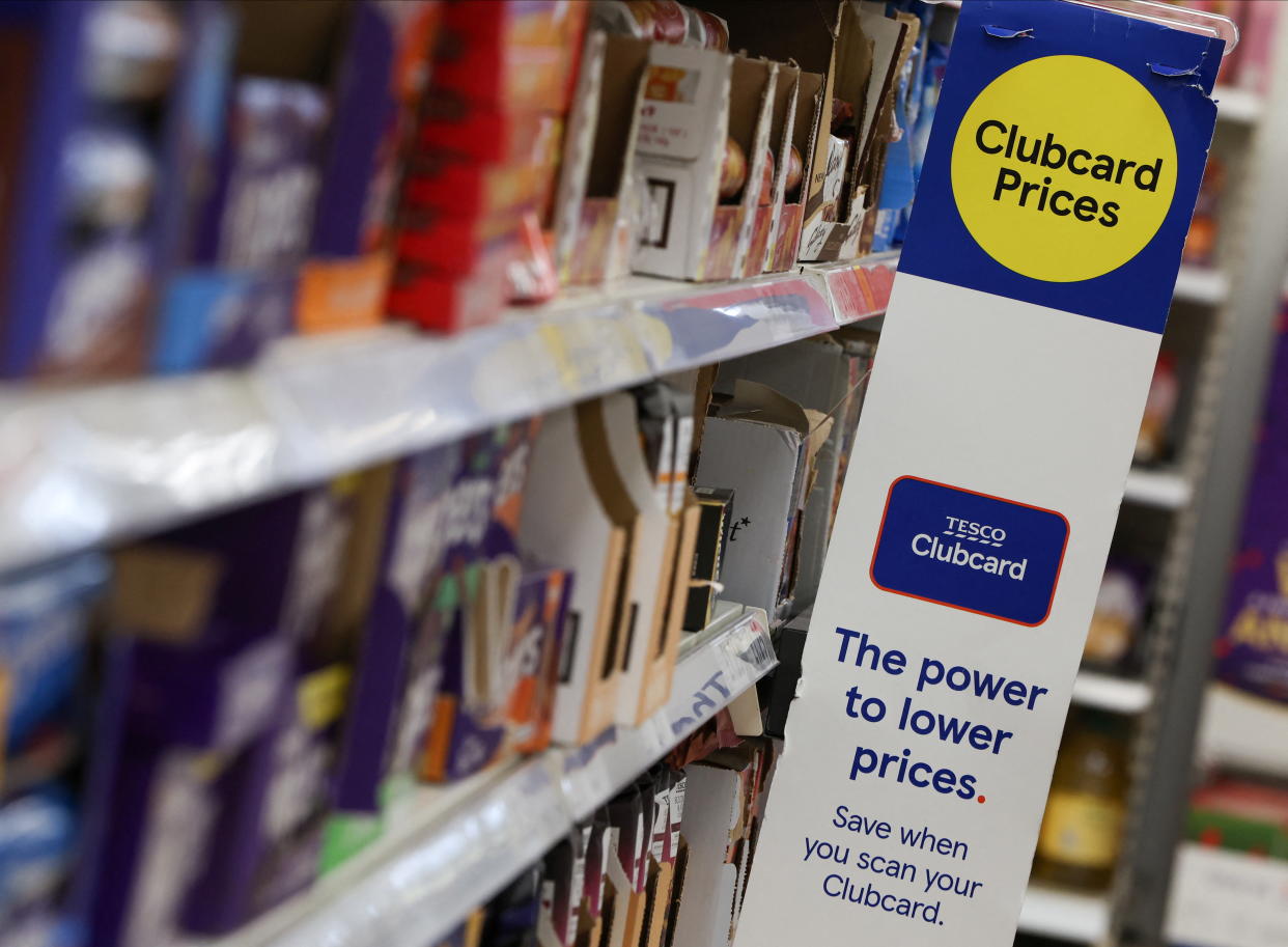 Clubcard branding is seen inside a branch of a Tesco Extra Supermarket in London, Britain, February 10, 2022. Picture taken February 10, 2022. REUTERS/Paul Childs