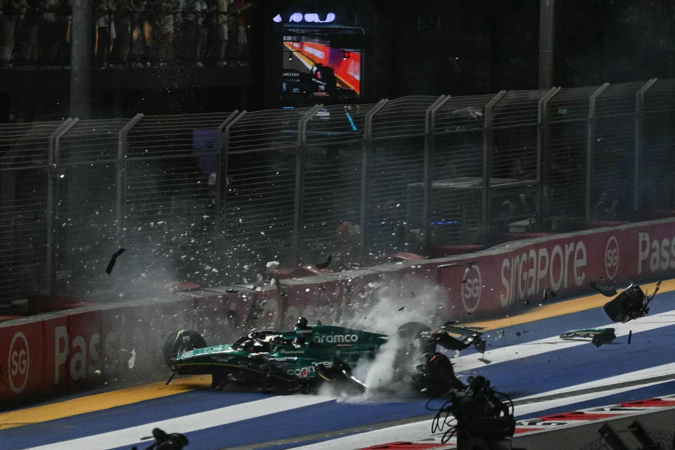 Aston Martin's Lance Stroll crashes during the qualifying session of the F1 Singapore Grand Prix. 