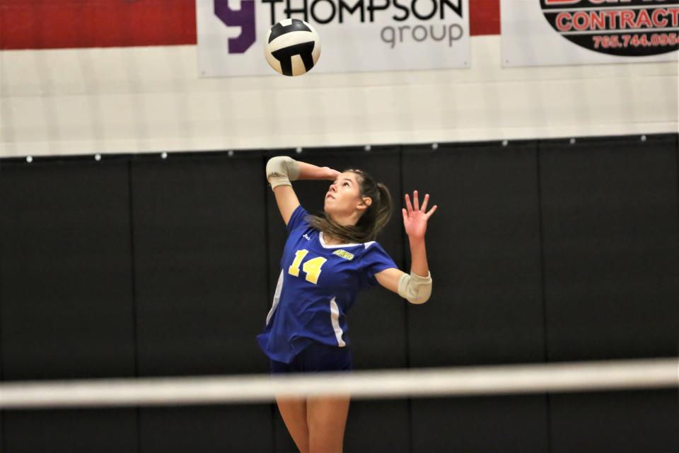 Muncie Burris volleyball's Layla Gonzales serves in the team's sectional championship match against Wapahani at Wapahani High School on Saturday, Oct. 15, 2022.