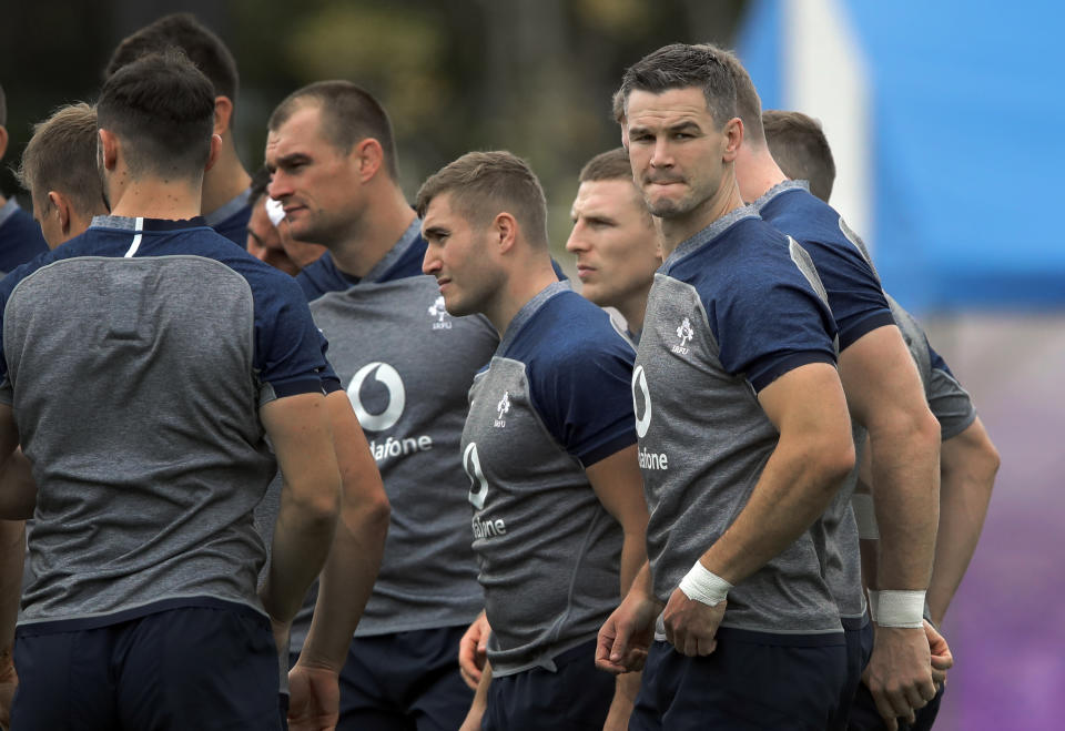 Ireland's Jonathan Sexton, right, attends a training session with teammates, in Urayasu, outside Tokyo, Japan, Tuesday, Oct. 15, 2019. Ireland will play New Zealand in a Rugby World Cup quarterfinal in Tokyo on Saturday Oct.19. (AP Photo/Christophe Ena)