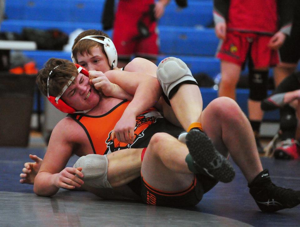 Loudonville's Caleb Gregory grapples with Dalton's Seth Ryder.