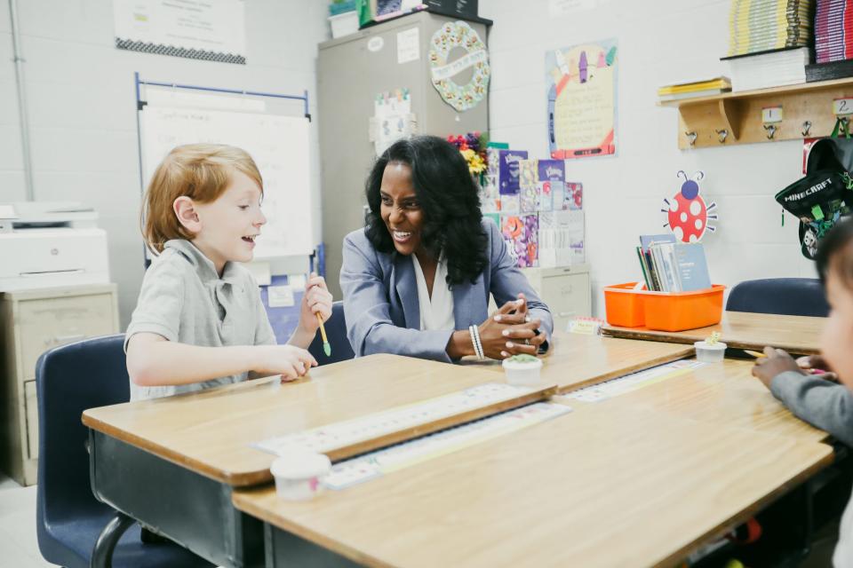 The new MSCS superintendent Dr. Marie Feagins smiles as an elementary student answers her question about their schoolwork during class during a tour on Thursday, April 04, 2024 at Kate Bond Elementary located at 2727 Kate Bond Road in Memphis, Tenn.