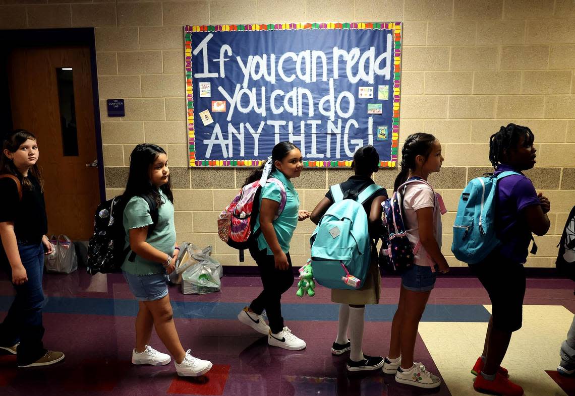 Students move through a hall to their first class of the day at Townley Elementary in Everman on Wednesday, August 10, 2022. Everman ISD serves a growing area south of Fort Worth and is on a five-day week schedule.