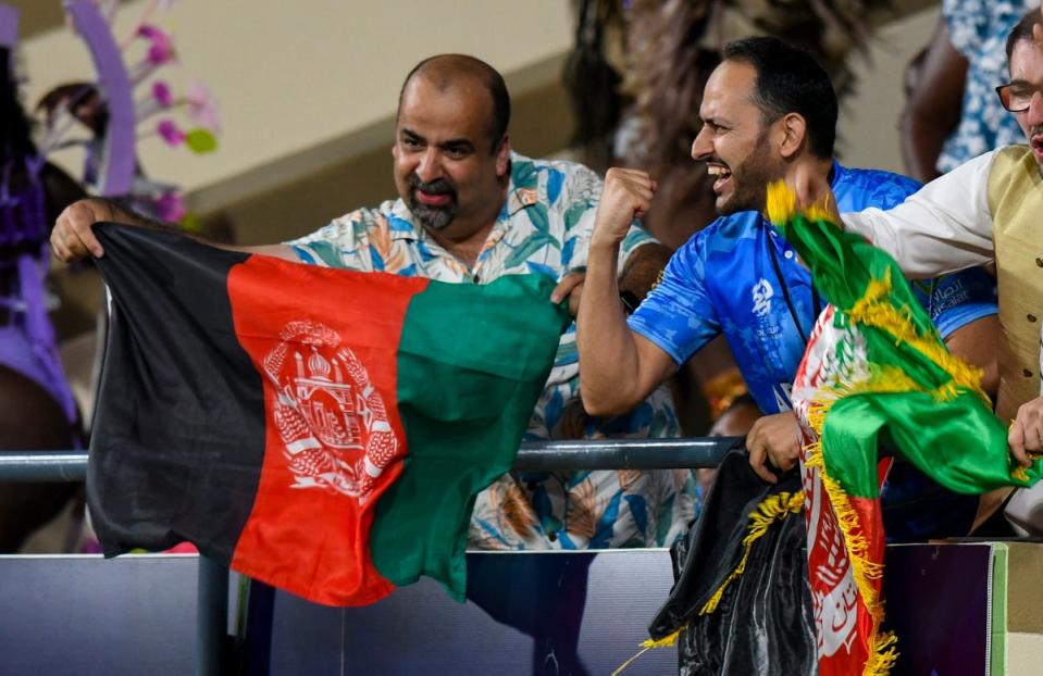 Supporters of Afghanistan cheer their team against Australia (AFP via Getty Images)