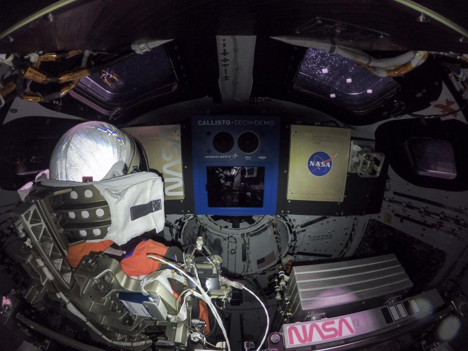 This high-resolution image captures the inside of the Orion crew module on flight day one of the Artemis I mission. At left is Commander Moonikin Campos, a purposeful passenger equipped with sensors to collect data that will help scientists and engineers understand the deep-space environment for future Artemis missions. At center is the Callisto payload, a technology demonstration of voice-activated audio and video technology from Lockheed Martin in collaboration with Amazon and Cisco. Callisto could assist future astronauts on deep-space missions. Below and to the right of Callisto is the Artemis I zero-gravity indicator, astronaut Snoopy.