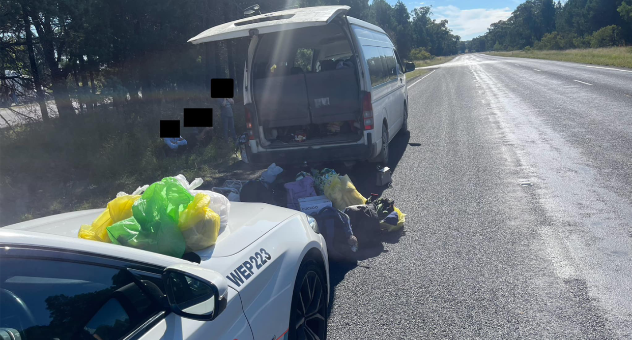 A van pulled over alongside a NSW highway pictured. 