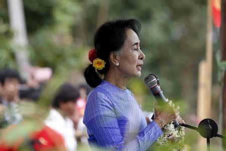 Myanmar opposition leader Aung San Suu Kyi gives a speech during her campaign for the upcoming general election in Hpasaung, Kayah state, September 11, 2015. REUTERS/Soe Zeya Tun