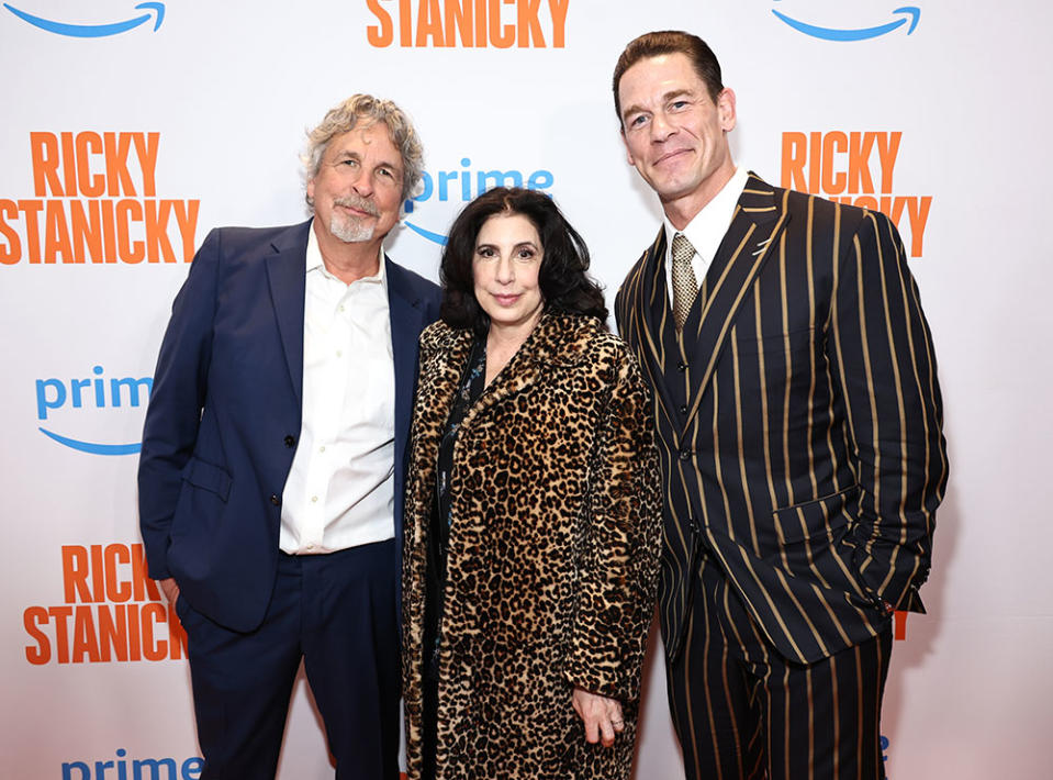 (L-R) Peter Farrelly, Sue Kroll and John Cena attend the "Ricky Stanicky" New York Premiere at Regal E-Walk on March 05, 2024 in New York City.