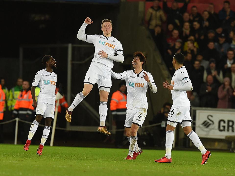 Alfie Mawson celebrates his winning strike: Liverpool FC via Getty Images