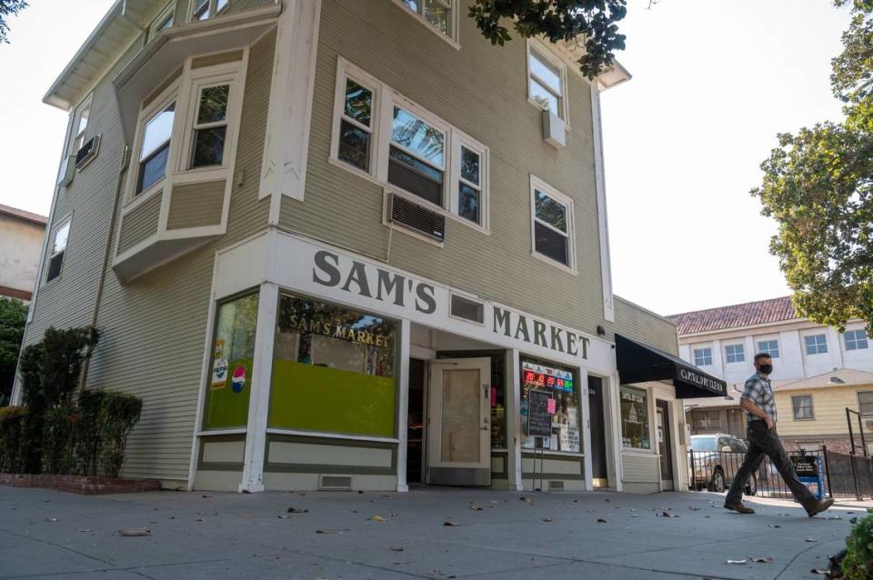 A customer leaves Sam’s Market at 1330 O St. on Thursday, Sept. 17, 2020 in downtown Sacramento. The store opened in 1941.