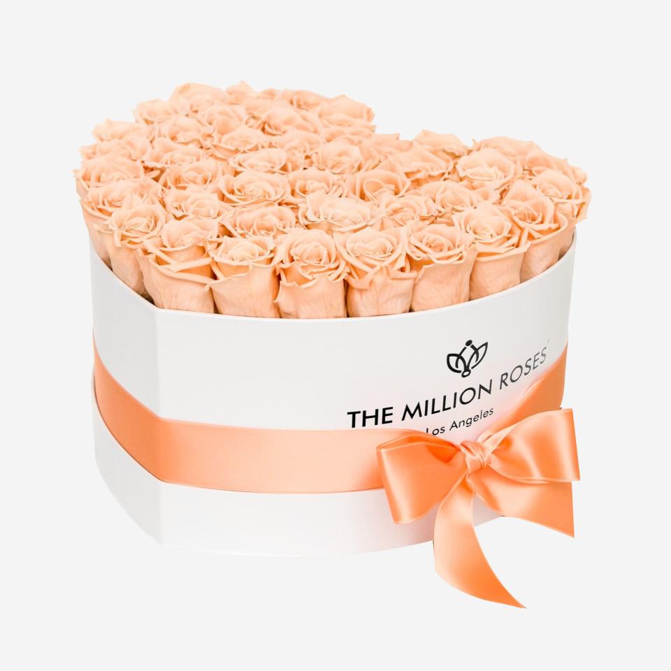 <p><a href="https://go.redirectingat.com?id=74968X1596630&url=https%3A%2F%2Fthemillionroses.com%2Fproducts%2Fheart-white-box-with-peach-roses%3F_pos%3D7%26_sid%3D71ab0ad42%26_ss%3Dr&sref=https%3A%2F%2Fwww.cosmopolitan.com%2Flifestyle%2Fg46286770%2Fpantone-2024-color-of-the-year%2F" rel="nofollow noopener" target="_blank" data-ylk="slk:Shop Now;elm:context_link;itc:0;sec:content-canvas" class="link ">Shop Now</a></p><p>Peach Roses in Heart White Box</p><p>themillionroses.com</p><p>$450.00</p>