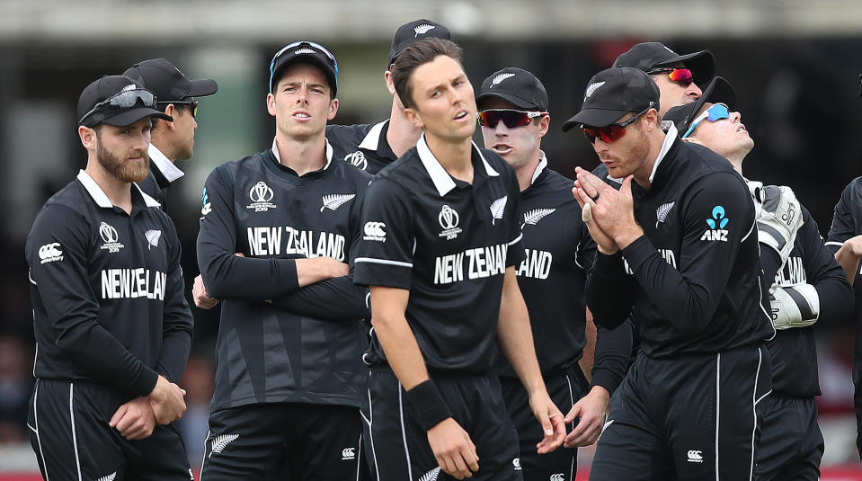 New Zealand's Trent Boult (centre) appears dejected after the review for England's Jason Roy out by LBW is not given during the ICC World Cup Final at Lord's, London.