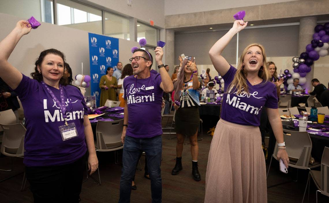 Steve Ryan, center, and Elise Grisoni, right, both from The Miami Foundation, celebrate hitting the $14 million mark with attendees during the Give Miami Day fundraising event hosted by The Miami Foundation on Thursday, Nov. 16, 2023, held at Miami Dade College Medical Campus. “Every time we hit a million dollars the rooms goes crazy, it’s not about whether my org or your org, it’s about the collective benefit for Miami,” said Miami Foundation CEO Rebecca Fishman Lipsey. Alie Skowronski/askowronski@miamiherald.com