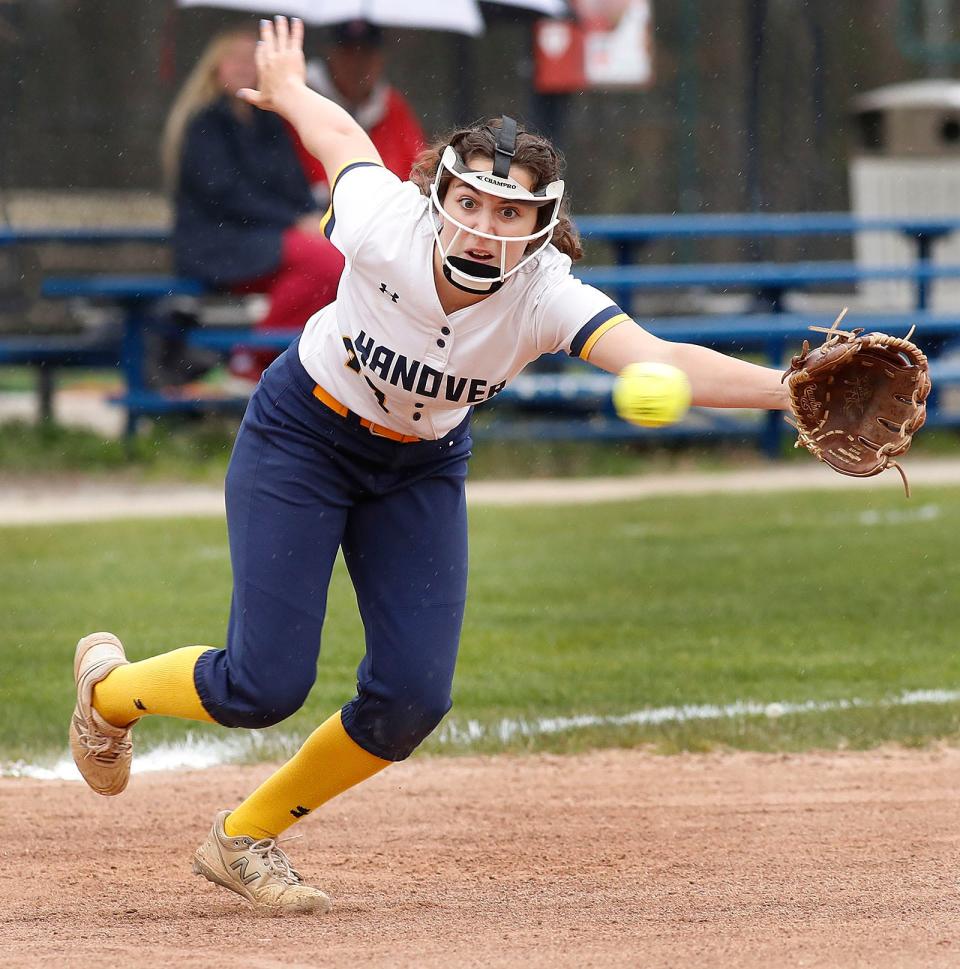 Hanover's McKenzie Foley reaches for a hard-hit line drive at third base during a game against Plymouth North on Monday May 2, 2022.