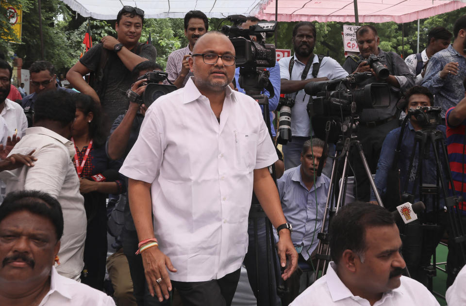 Karti Chidambaram, son of former Indian Finance Minister Palaniappan Chidambaram, arrives for an all party meeting to protest against the revocation of Kashmir's special constitutional status from Indian state of Jammu and Kashmir, in New Delhi, India, Thursday, Aug. 22, 2019. Karti Chidambaram has already been named as a defendant in the money-laundering case involving 3 billion rupees ($43 million). His father Palaniappan Chidambaram has already been arrested in the case. (AP Photo/Manish Swarup)