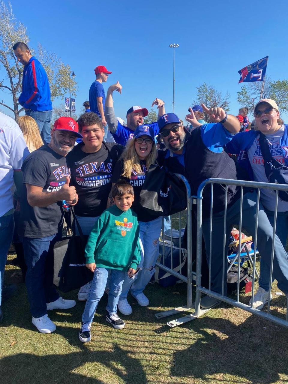 Life-long Rangers fan Kamal Heikal, second from the right, poses with fellow fans.