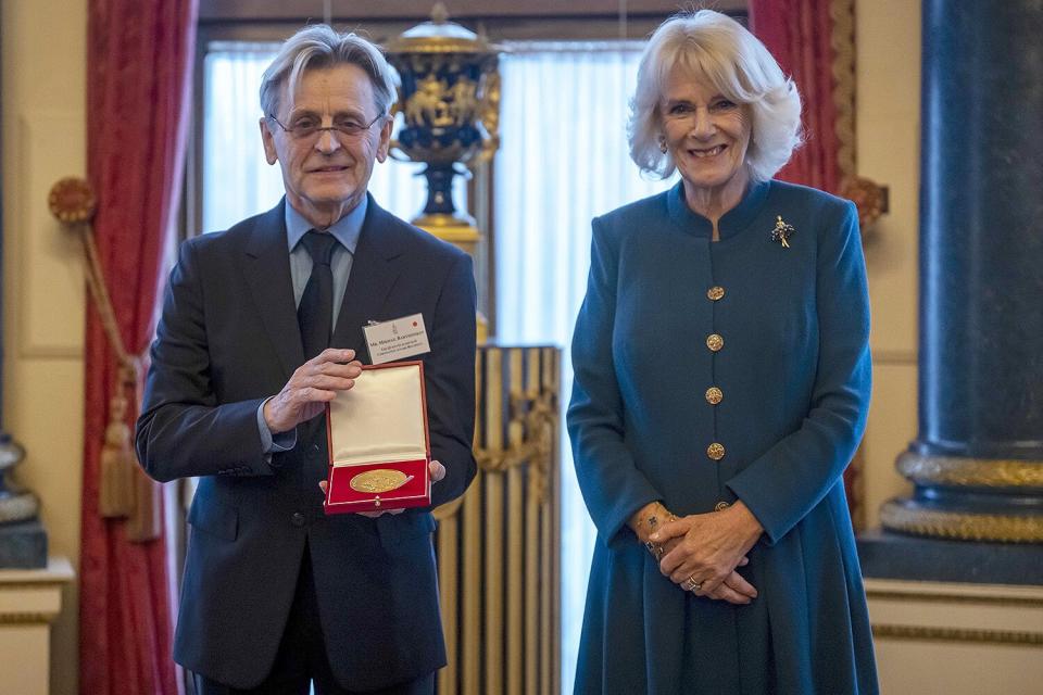 Britain's Camilla, the Queen Consort presents Mikhail Baryshnikov with the Royal Academy of Dance's highest honour, the Queen Elizabeth II Coronation Award, in recognition of his contribution to ballet and the wider world of dance, during a ceremony in the White Drawing Room at Buckingham Palace, London