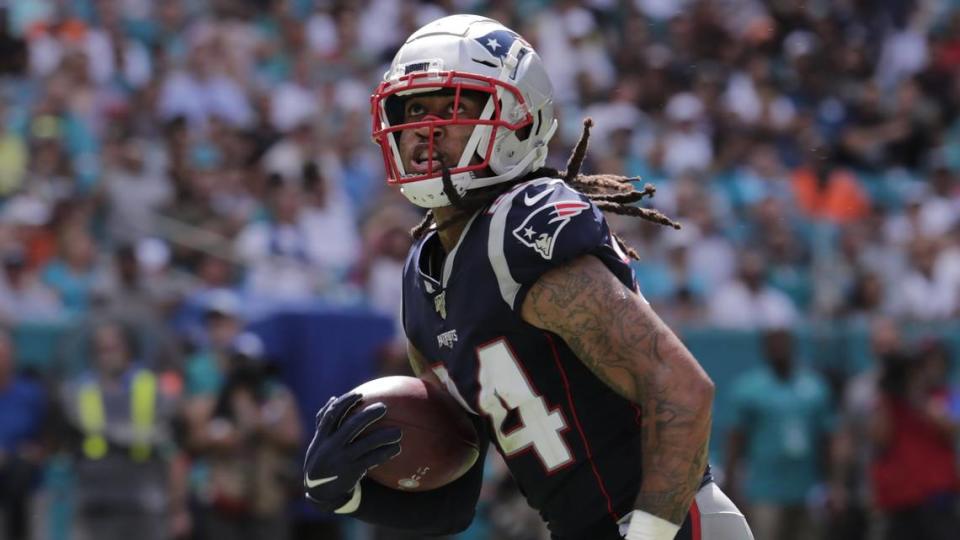 New England Patriots cornerback Stephon Gilmore (24) runs for a touchdown, during the second half at an NFL football game against the Miami Dolphins, Sunday, Sept. 15, 2019, in Miami Gardens, Fla. (AP Photo/Lynne Sladky)