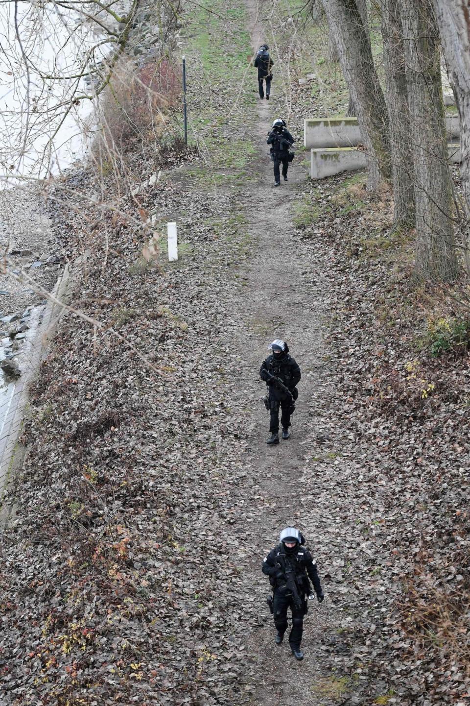 Armed police are involved in the search (AFP/Getty Images)