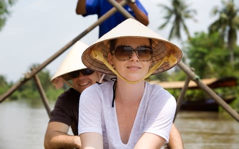 Couple on a Mekong river cruise - Credit: iStock