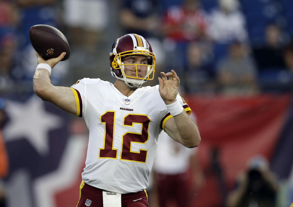 Washington Redskins quarterback Colt McCoy passes against the New England Patriots during the first half of a preseason NFL football game, Thursday, Aug. 9, 2018, in Foxborough, Mass. (AP Photo/Charles Krupa)