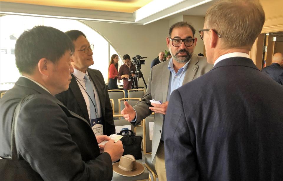 El Paso City Rep. Peter Svarzbein, center, talks to Brent Omdahl, right, commercial section chief at the American Institute in Taiwan, Tony Yuan, left center, board member of the Taiwan Electrical and Electronic Manufacturers Association, and Michael Tsung, of the Importers and Exporters Association of Taipei, after a June 30 press conference at the Hotel Paso Del Norte in Downtown El Paso.