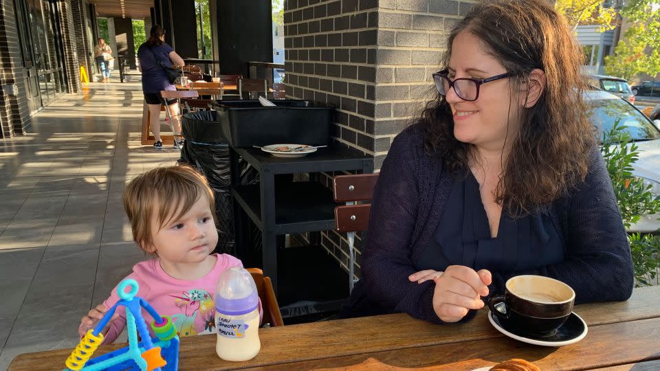 In this photo from a calmer moment a few months earlier, my daughter takes in the sights as we pause for a break at our local coffee shop. - Catherine Shoichet/CNN