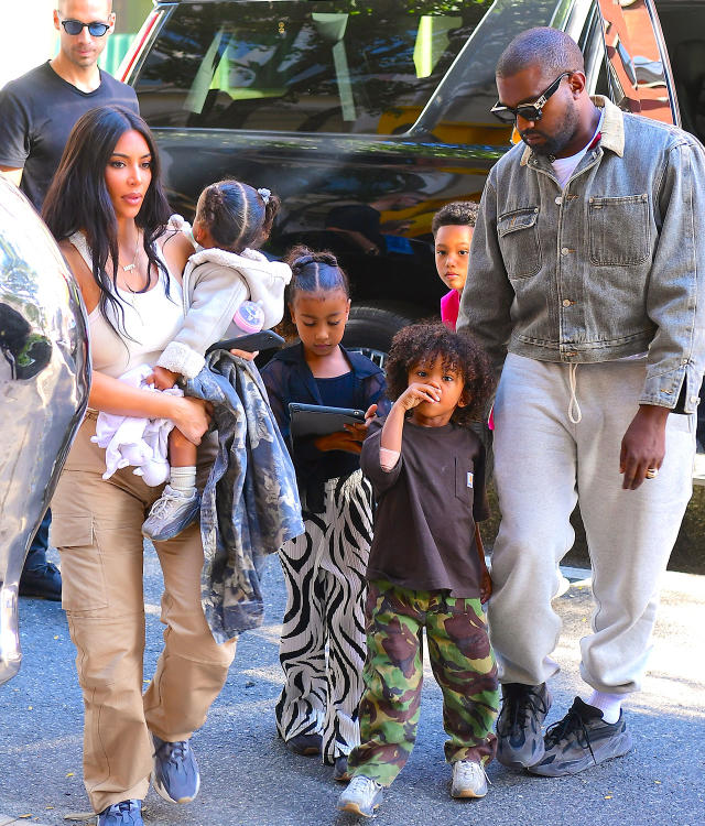 Kim Kardashian & Kanye West Put On Affectionate Display At Son