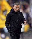 Wolverhampton Wanderers' head coach Gary O'Neil walks before the English Premier League soccer match between Wolverhampton Wanderers and Bournemouth at Molineux, Wolverhampton, England, Wednesday April 24, 2024. (Joe Giddens/PA via AP)