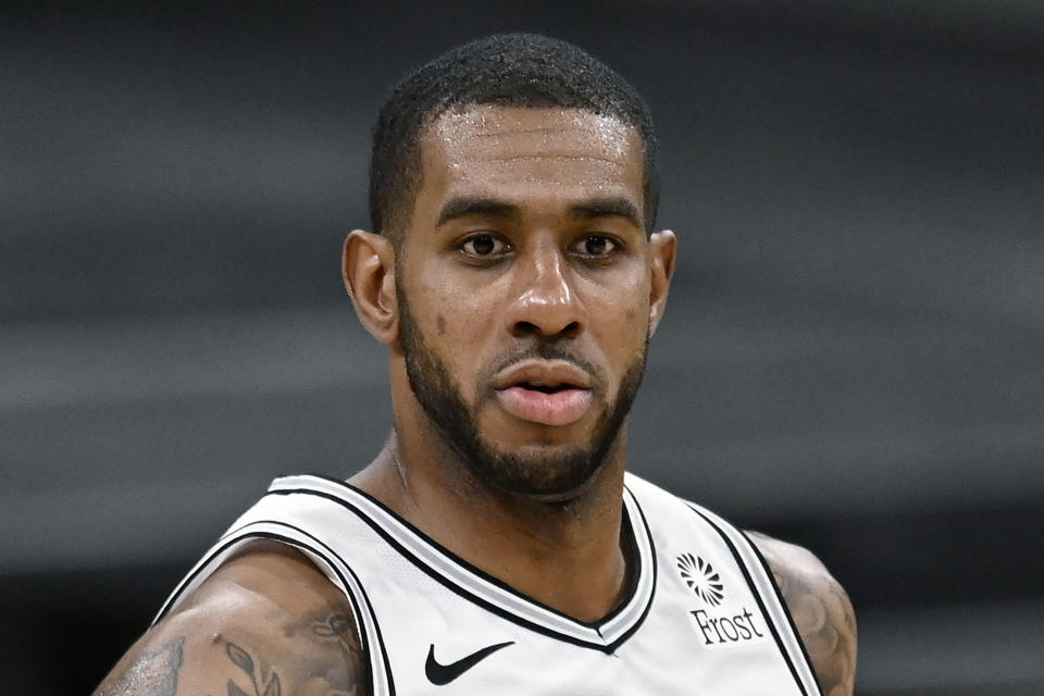 FILE - Then-San Antonio Spurs' LaMarcus Aldridge runs up the court during the second half of an NBA basketball game against the Memphis Grizzlies in San Antonio, in this Saturday, Jan. 30, 2021, file photo. Aldridge retired from the NBA on Thursday, April 15, 2021, after saying he experienced an irregular heartbeat during his final game with the Brooklyn Nets. Aldridge, 35, posted a statement on social media saying the heart concern he had during and after Brooklyn's victory over the Los Angeles Lakers on Saturday was one of the “scariest things” he's experienced. (AP Photo/Darren Abate, File)