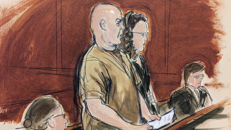 In this courtroom sketch, defendant Lawrence Ray, left, makes a statement during his sentencing in Manhattan federal court, Friday, Jan. 20, 2023 in New York, as his defense attorney, Peggy Cross-Goldenberg looks on. Ray, an ex-convict who obtained millions of dollars by subjecting his daughter's ex-college roommates to forced labor and prostitution has been sentenced to 60 years in prison. (Elizabeth Williams via AP)