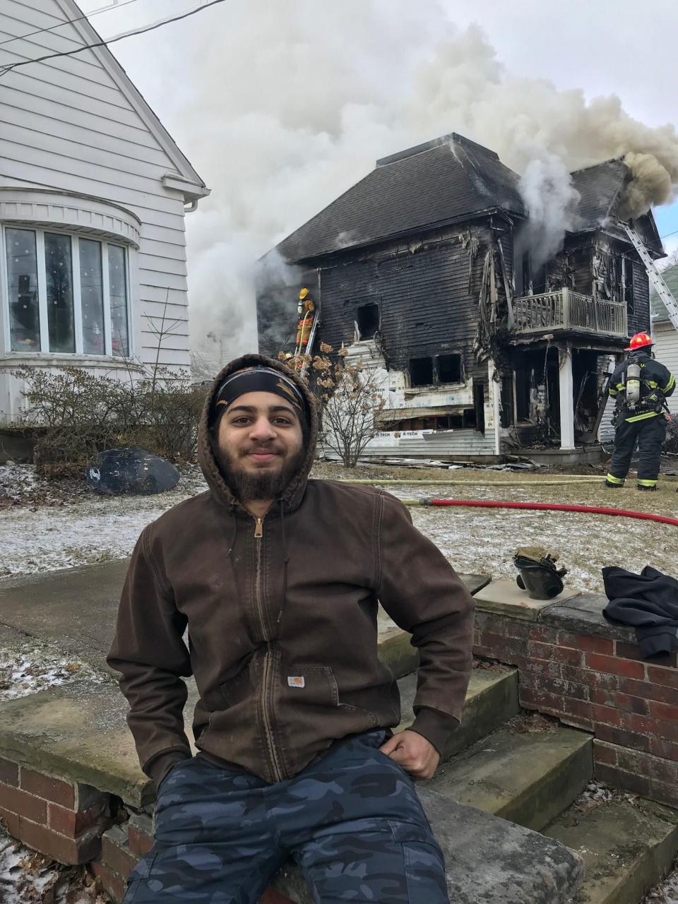 Davian Ross, 20, saved a boy from the burning house at 146 E. Main St., Shelby, on Thursday morning.