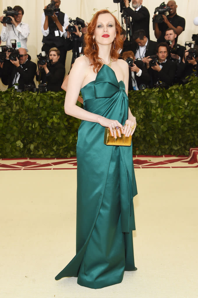 <p>Karen Elson attends the Heavenly Bodies: Fashion & The Catholic Imagination Costume Institute Gala at The Metropolitan Museum of Art on May 7, 2018 in New York City. (Photo: Getty Images) </p>