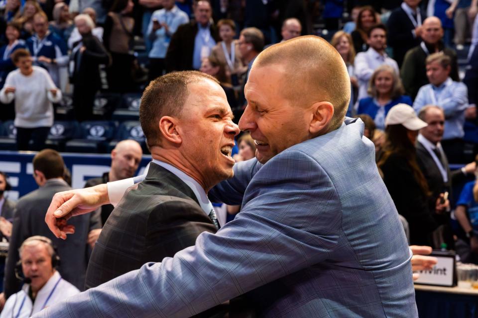 Left to right, Brigham Young Cougars assistant coach Nick Robinson hugs Brigham Young Cougars head coach Mark Pope after their victory 78-71 over Baylor University in a men’s college basketball game at the Marriott Center in Provo on Tuesday, Feb. 20, 2024. | Megan Nielsen, Deseret News