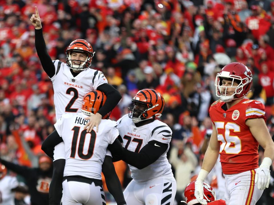 Evan McPherson celebrates his game-winning kick against the Kansas City Chiefs in the AFC Championship.