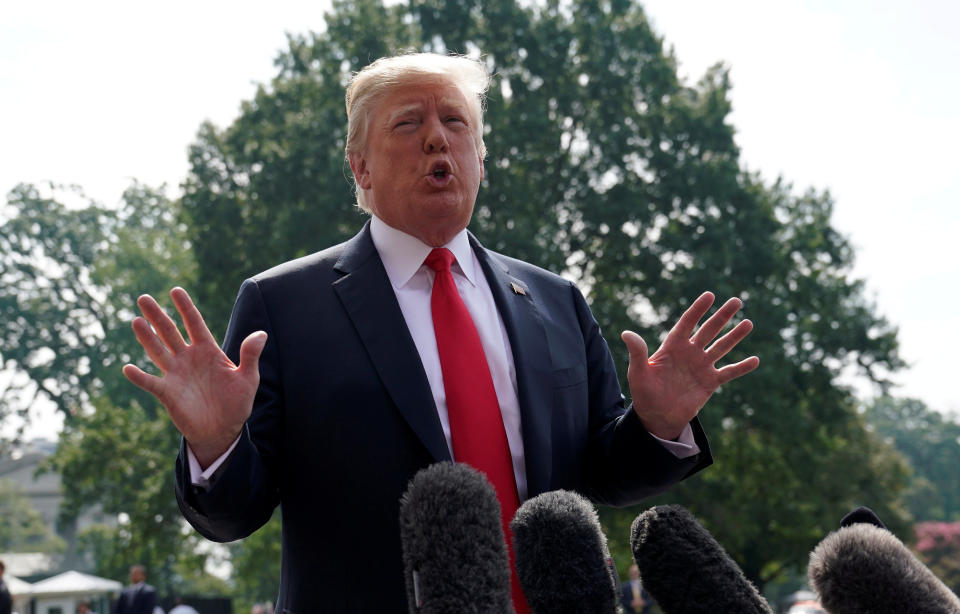 U.S. President Donald Trump speaks to reporters upon his departure from the White House in Washington, U.S., August 17, 2018. REUTERS/Kevin Lamarque