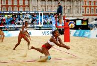 <p>Most beach volleyball athletes prefer to go barefoot during competition in order to help with their mobility in the sand. Lucky for them, there's <a href="https://go.redirectingat.com?id=74968X1596630&url=https%3A%2F%2Fwww.groupon.com%2Farticles%2Fbeach-volleyball-tips&sref=https%3A%2F%2Fwww.womenshealthmag.com%2Flife%2Fg38884176%2Ftop-rules-olympic-athletes%2F" rel="nofollow noopener" target="_blank" data-ylk="slk:no mandatory policy;elm:context_link;itc:0;sec:content-canvas" class="link ">no mandatory policy</a> for athletes to wear footwear during matches at the Olympics.</p>