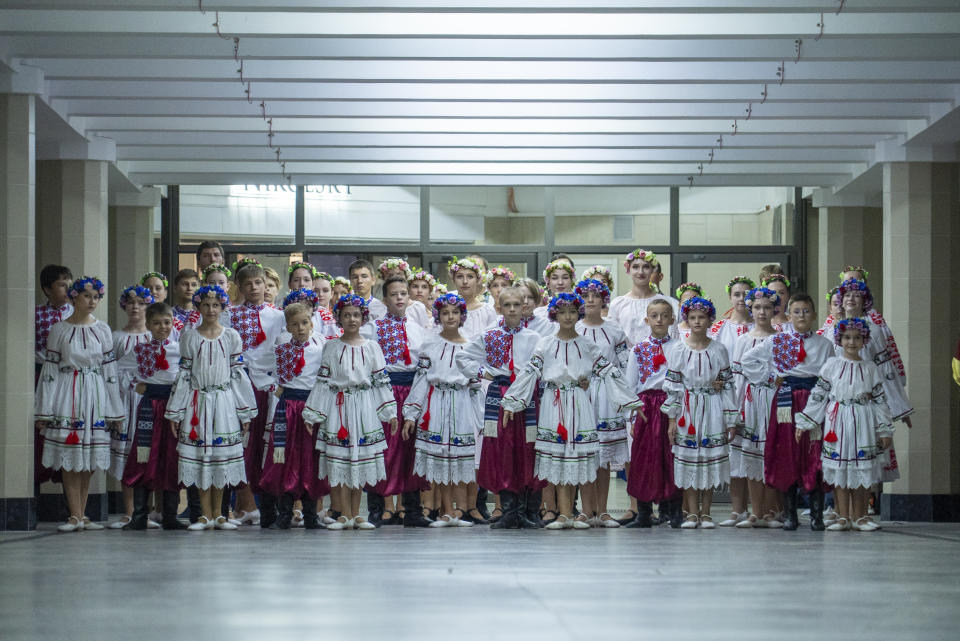 Schoolchildren attend a ceremony on the first day at school in safe place - an underground subway station, in Kharkiv, Ukraine, Friday, Sept. 1, 2023. Ukraine marks Sept. 1 as Knowledge Day, as a traditional launch of the academic year. (AP Photo/Mstyslav Chernov)