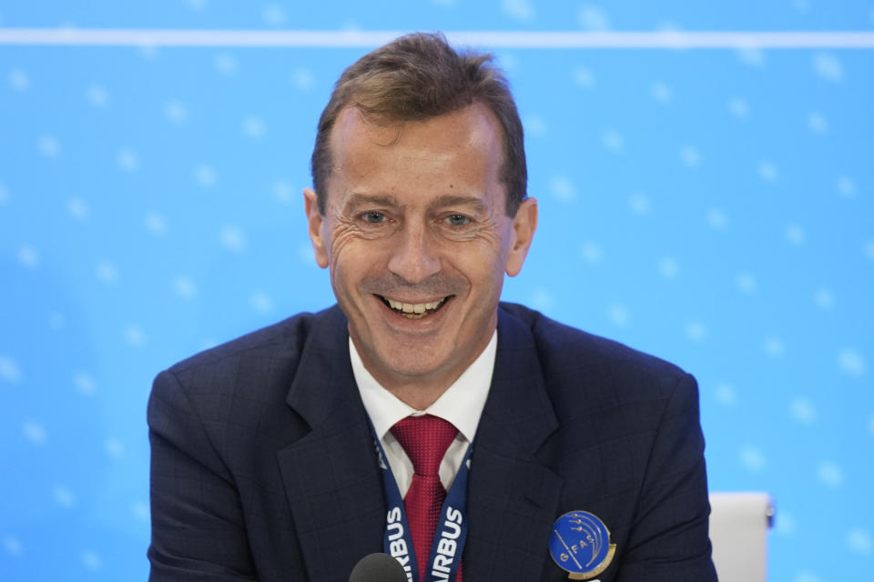 Airbus CEO Guillaume Faury smiles at a news conference during the Paris Air Show in Le Bourget, north of Paris, France, Monday, June 19, 2023. (AP Photo/Lewis Joly)