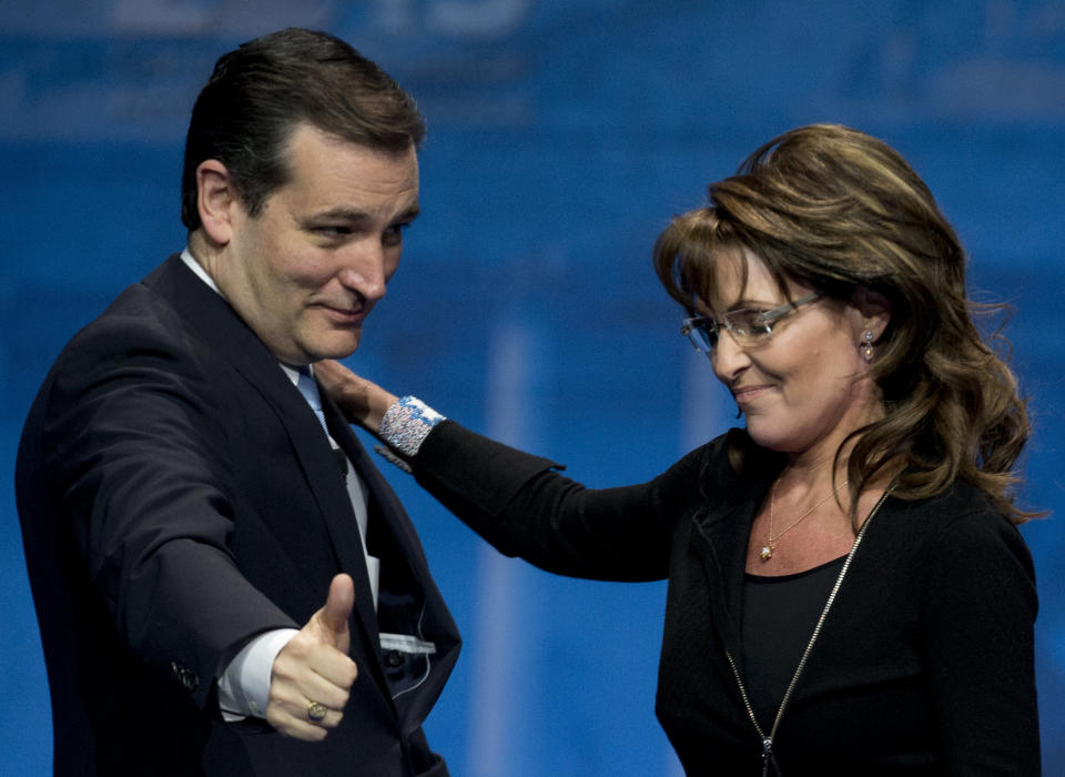 Sen. Ted Cruz (R-Texas) left, greets Former Alaska Gov. Sarah Palin (R) after introducing her at the 40th annual Conservative Political Action Conference in National Harbor, Md., Saturday, March 16, 2013. Diehard activists at the three-day conference are already picking favorites in what could be a crowded Republican presidential primary in 2016. (AP Photo/Carolyn Kaster)