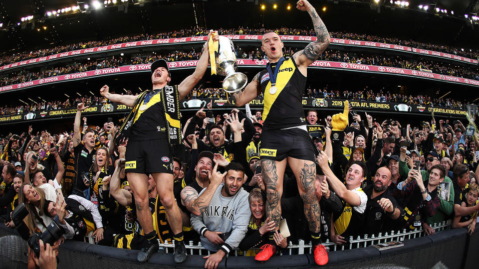 Richmond players, pictured here celebrating their 2019 grand final victory at the MCG.