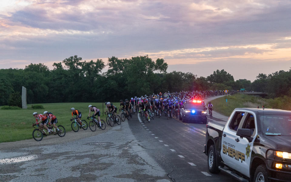 The rest of the 200 mile field rolled out at 6AM, but the field split in half 5 blocks south of the start by a freight train.