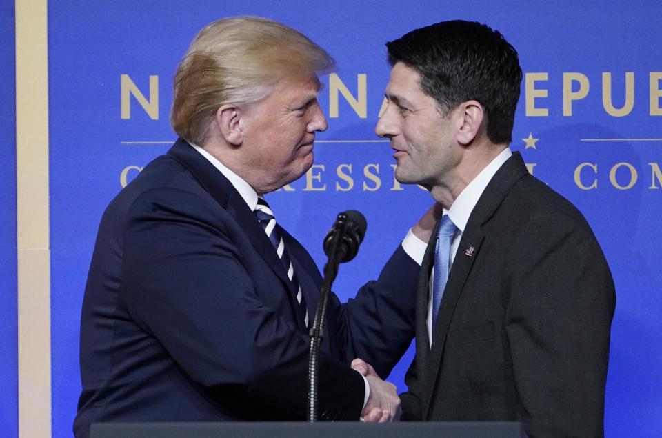 House Speaks Paul Ryan greets President Trump onstage at the National Republican Congressional Committee March Dinner at the National Building Museum on March 20, 2018, in Washington, D.C. (Mandel Ngan/AFP/Getty Images)