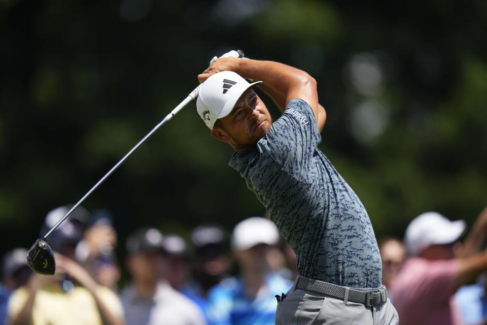 Xander Schauffele hits from the first tee during the final round of the Travelers Championship golf tournament at TPC River Highlands, Sunday, June 25, 2023, in Cromwell, Conn. (AP Photo/Frank Franklin II)