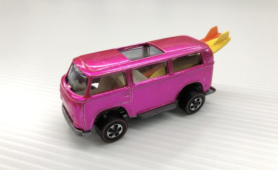 <p>Widely heralded as the most collectible Hot Wheels extant, the rear-loading Beach Bomb is a prototype that for years remained in the possession of a Mattel employee. Unique in that its surfboards load through the rear window, the Beach Bomb proved to be too narrow and top-heavy, so the design was replaced with a slightly different version that featured side-mounted surfboards and a full-length plastic sunroof for a lower center of gravity. Although a few additional copies in different colors managed to slip into public hands, only two Pink versions are known to exist. </p>